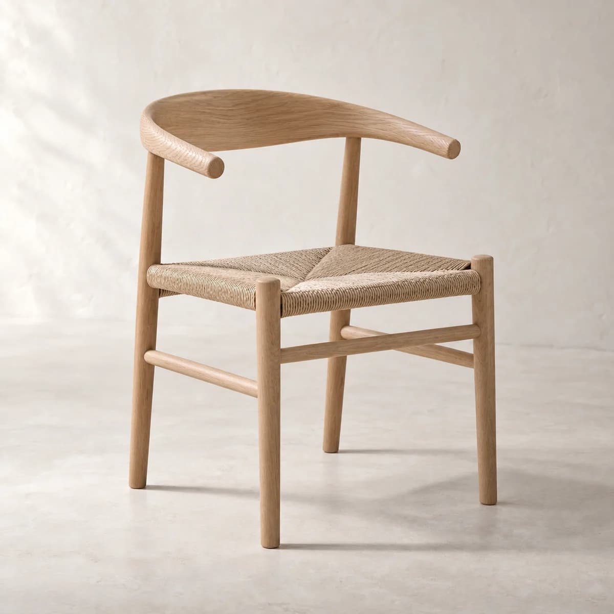 Reed Dining Chair, alternate view in a softly lit plaster studio; AI-generated product concept